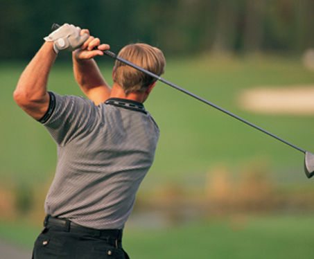 golfer taking a swing